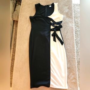 Black and white venus dress tie on side zips in back